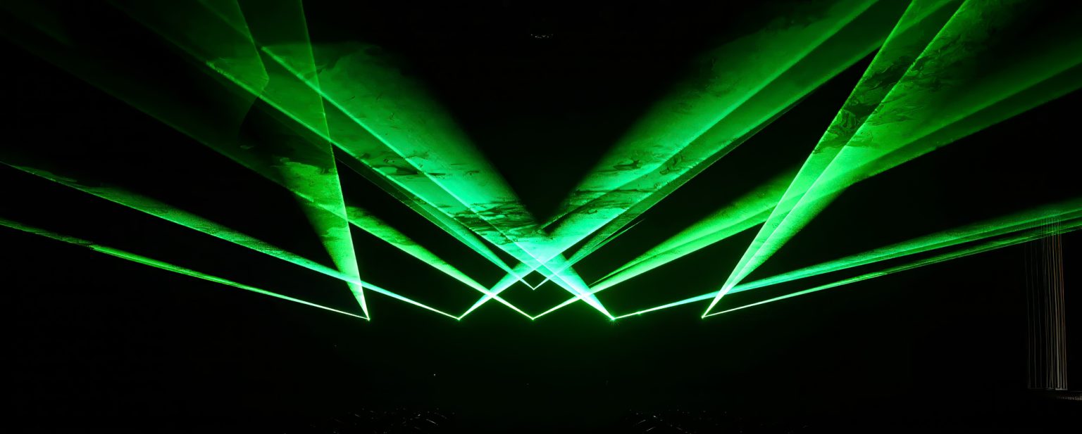 Disco laser lights projected by the LaserCube laser light projector indoors
