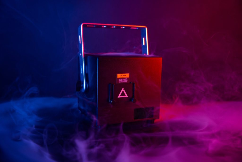 6 The new lasercube ultra mk2 with purple and blue smoke around it.